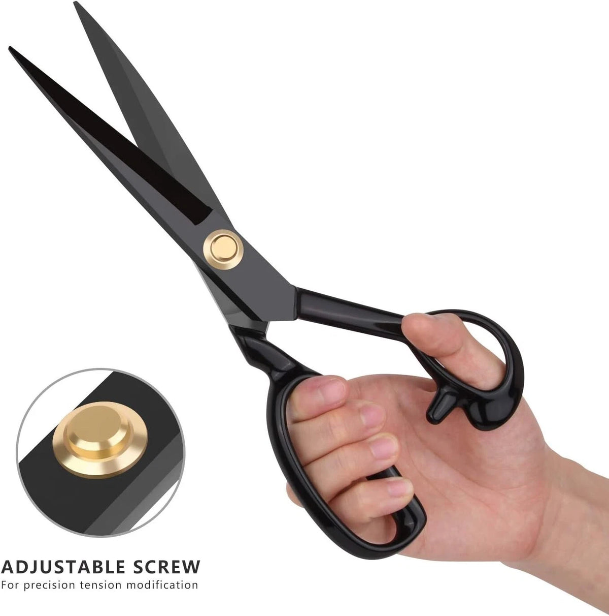 Hand holding professional black dressmaking shears featuring adjustable gold pivot screw