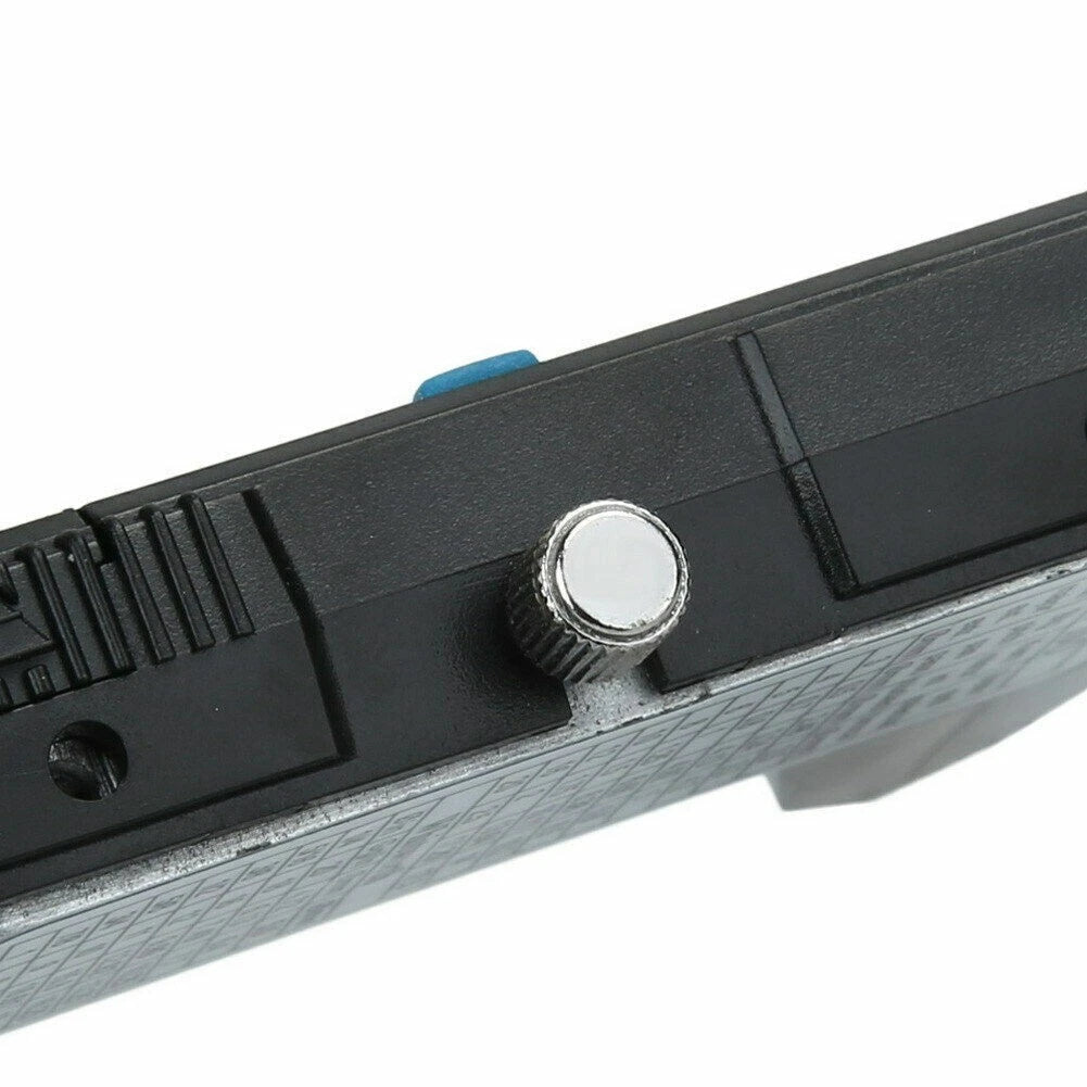 Close up shot of the knurled metal locking screw on a digital vernier caliper